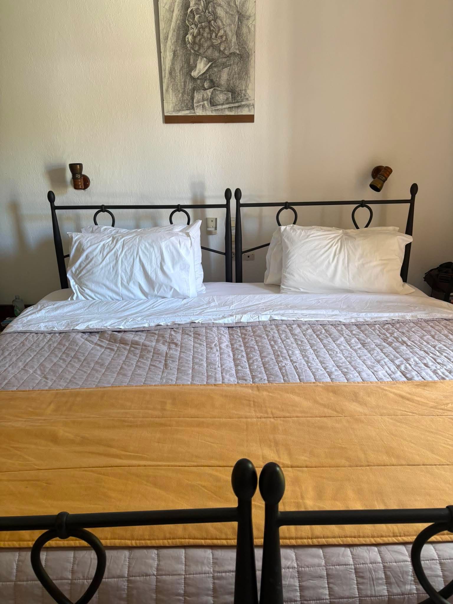 An interior bedroom view at Green Park Hotel, Skiathos